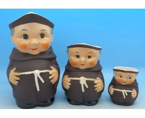 A set of three graduated Goebel jugs