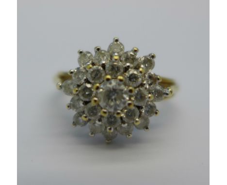 A 9ct gold and diamond cluster ring, 1 carat diamond weight, 3.5g, J