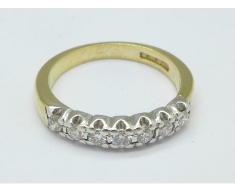 A 9ct gold and seven stone ring, 3g, L