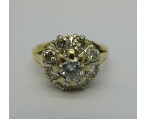 A yellow metal, diamond cluster ring, approximately 1.30 carat diamond weight, 5.6g, M