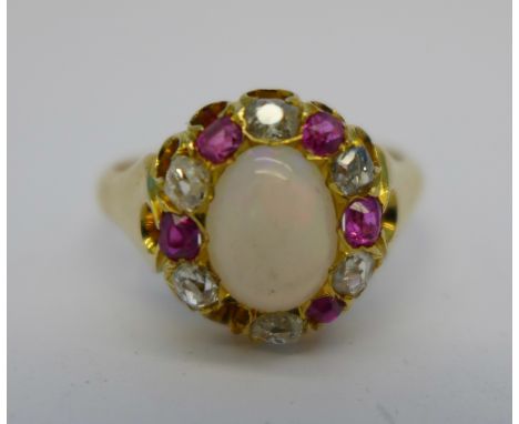 A Victorian 18ct gold, ruby, diamond and opal ring, lacking one ruby, 6.8g, U, Birmingham 1879