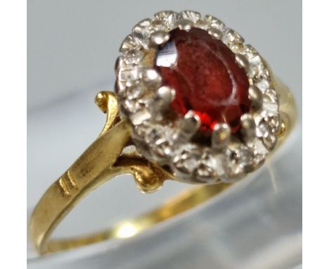 Yellow metal diamond and ruby cluster ring. Indistinct and rubbed hallmarks, illegible. 3.5g approx. Ring size P. (B.P. 21% +