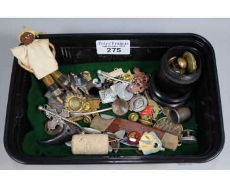 Collection of oddments to include: wire African doll, lock knife, enamel badges, miliary items, medals and medallions, etc. (