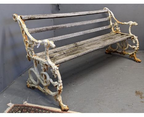 Cast iron garden bench with hounds head terminals and snake designs, having wooden slats. Probably 19th century.168cm wide ap
