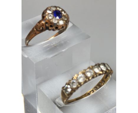 Two 9ct gold dress rings with blue and clear stones. 3.4g approx. Ring sizes L and O 1/2. (2) (B.P. 21% + VAT)