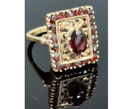 9ct gold and garnet dress ring. 5.9g approx. Ring size L 1/2. (B.P. 21% + VAT)