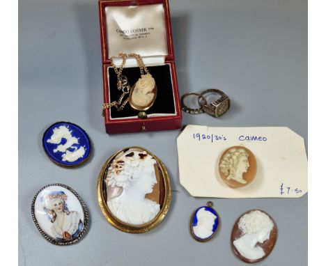 Collection of framed and unframed cameo portrait brooches, one on a plated chain. Together with a rolled gold dress ring and 