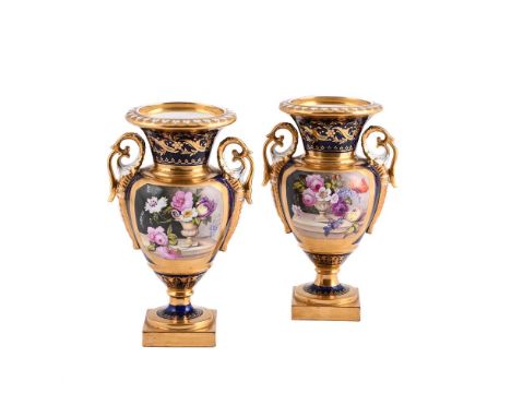 A PAIR OF ENGLISH PORCELAIN, PROBABLY WORCESTER, TWIN HANDLED PEDESTAL URNS  CIRCA 1830  Probably Chamberlain's or Grainger's