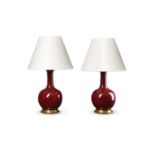 A PAIR OF CHINESE SANG DE BOEUF VASE TABLE LAMPS