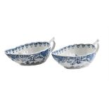 A PAIR OF WORCESTER BLUE AND WHITE PAINTED SAUCEBOATS, CIRCA 1775