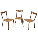 A SET OF THREE HARDWOOD AND RUSH SEATED SIDE CHAIRS