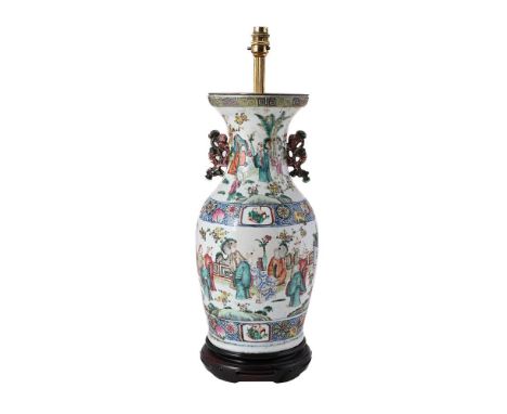 A CHINESE FAMILLE ROSE VASE 19TH CENTURY Decorated with two sections of garden scenes, flanked by scroll handles, vase conver