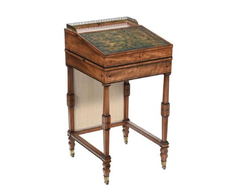 A MAHOGANY WRITING TABLE IN THE MANNER OF GEORGE OAKLEY, CIRCA 1810 - 1820  The raising banner to the rear and with a 'Davenp