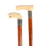 Y TWO IVORY HANDLED MALACCA WALKING STICKS, LATE 19TH OR EARLY 20TH CENTURY