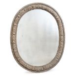 A CARVED AND PAINTED OVAL MIRROR IN GEORGE III STYLE, 19TH CENTURY