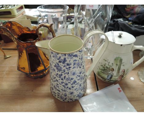 An enamel jug, a lustre ware jug, a celery jar etc