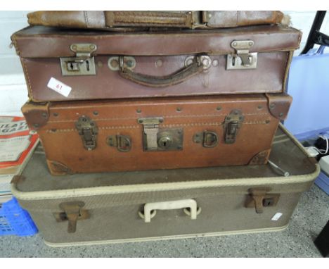 A selection of vintage suitcases and bags etc