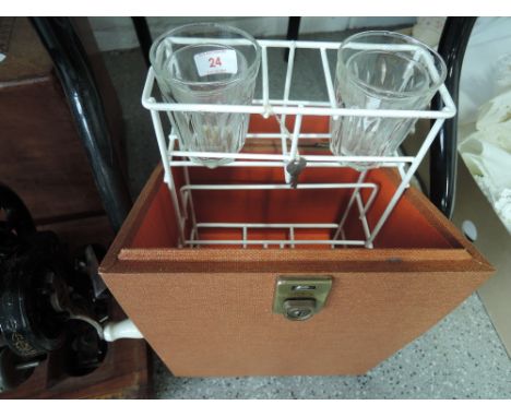 A travelling wine hamper with glasses 