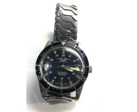 Gents Vintage Talis 1970s wristwatch automatic black dial &amp; bezel 24hour dial working order no warranty given 