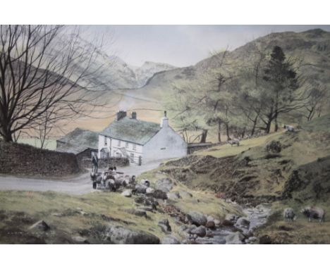 A FRAMED AND GLAZED PRINT OF A MOUNTAINOUS LANDSCAPE WITH A FIGURE DRIVING SHEEP BY ALAN INGHAM