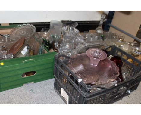 FOUR BOXES OF ASSORTED GLASSWARE TO INCLUDE VINTAGE GLASS BOTTLES, FLUTED VASE, DRINKING GLASSES ETC. 