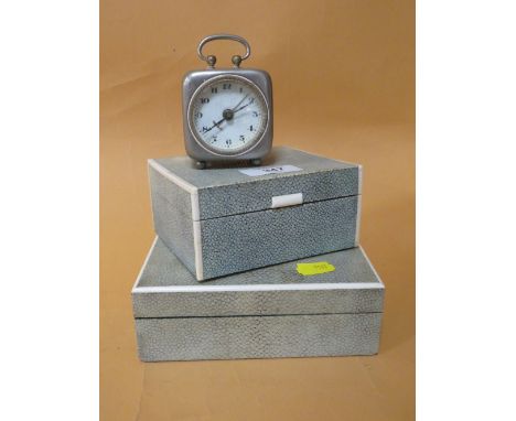 TWO SHAGREEN TYPE CIGARETTE BOXES TOGETHER WITH A VINTAGE TRAVELLING ALARM CLOCK 