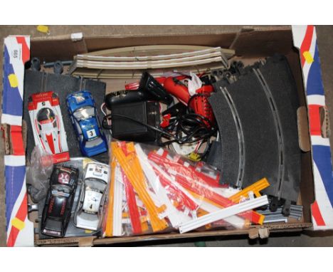 A TRAY OF SCALEXTRIC PARTS