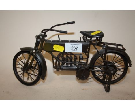 A MODERN METAL MODEL OF A VINTAGE MOTORBIKE