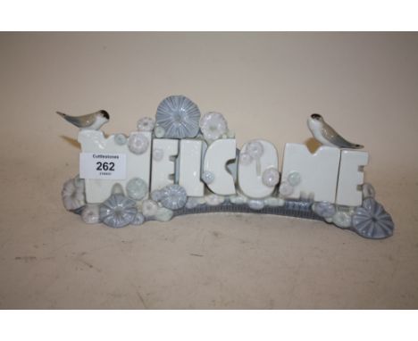 A NAO CERAMIC WELCOME SIGN - WIDTH 28CM