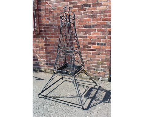 A LARGE WROUGHT 'EIFFEL TOWER' GARDEN OBELISK / PLANTER H-182 CM