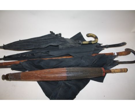 A CARVED BAMBOO WALKING CANE TOGETHER WITH FOUR VINTAGE PARASOLS A/F