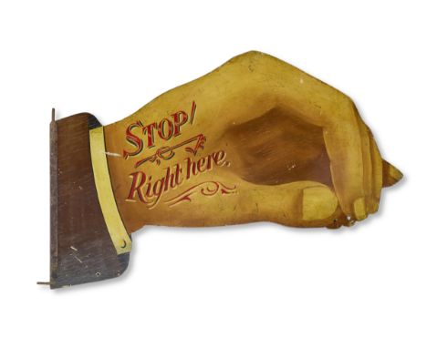 An Edwardian painted fret carved ticket signPainted on each side, in the form of a hand, with the words 'Stop Right Here', 98
