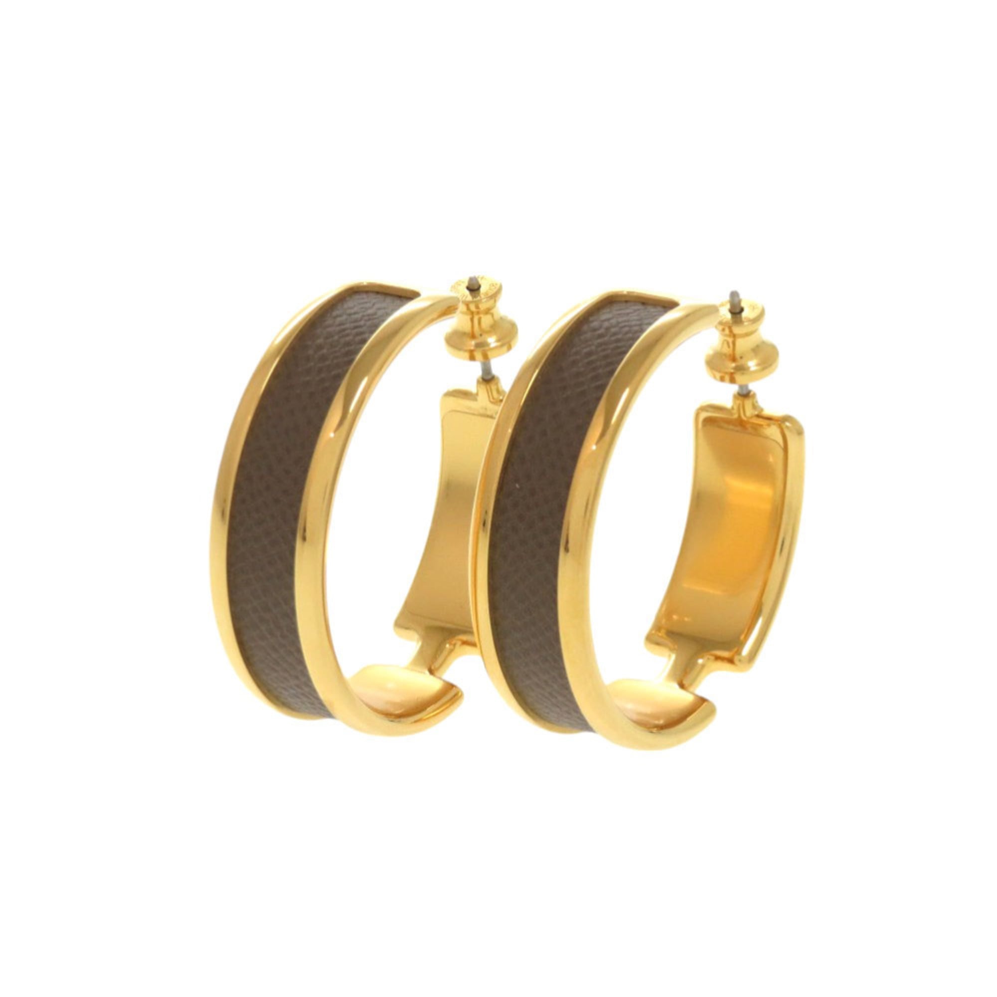 Unused Herms Olympe Etoupe earrings with gold hardware, 1567 HERMES