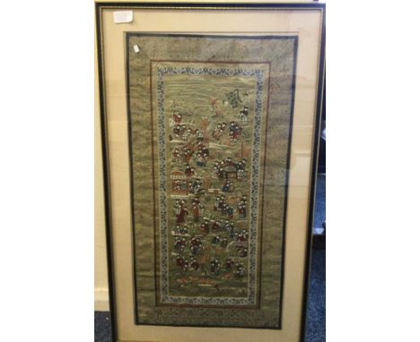An Oriental silk tapestry. Approx. 64cms x 34cms.