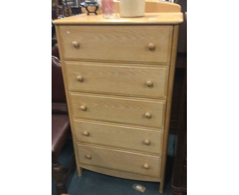 A modern chest of six drawers.