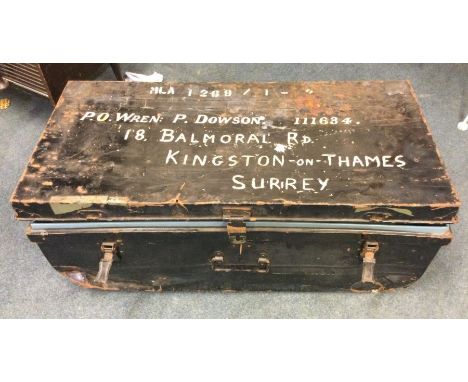 An old tin trunk together with military contents.