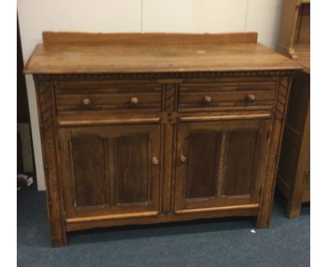 ERCOL: A good two door sideboard.