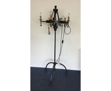 A wrought iron light fitting.