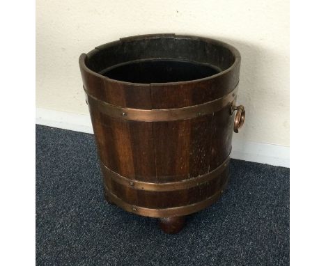 A brass bound planter.