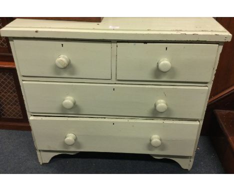 A pine chest of four drawers.
