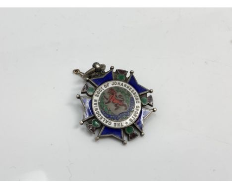A silver and enamel medal for the Caledonian society of Johannesburg