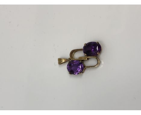 A 9ct gold amethyst set pendant