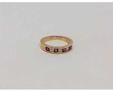 An 18ct gold ruby and diamond ring, size J CONDITION REPORT: 2.9g