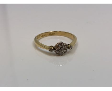 An antique 18ct gold floral cluster ring, 2.6g, size N/O.