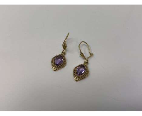 A pair of 9ct gold amethyst drop earrings. CONDITION REPORT: 1.5g