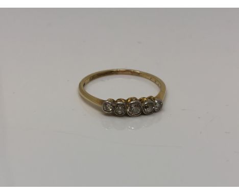 An antique 18ct gold five stone diamond ring, size R1/2 CONDITION REPORT: 1.9g