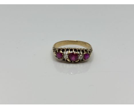 An 18ct gold ruby and diamond ring, size O CONDITION REPORT: 3.3g - The hallmark is rubbed so not able to date this but I wou