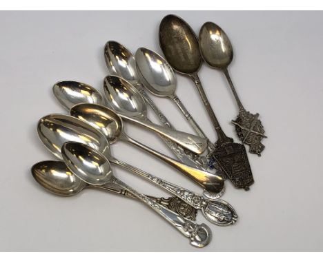 A collection of silver rifle and regimental spoons 