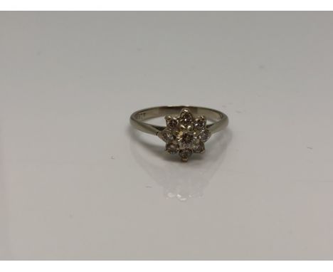 An 18ct white gold diamond cluster ring, size N CONDITION REPORT: 2.7g