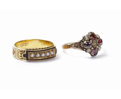 VICTORIAN FIFTEEN CARAT GOLD MOURNING RING set with a central row of split pearls within a black enamel border, with hair sec